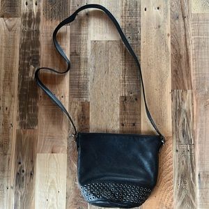 Coach Bucket Bag with grommet detail.